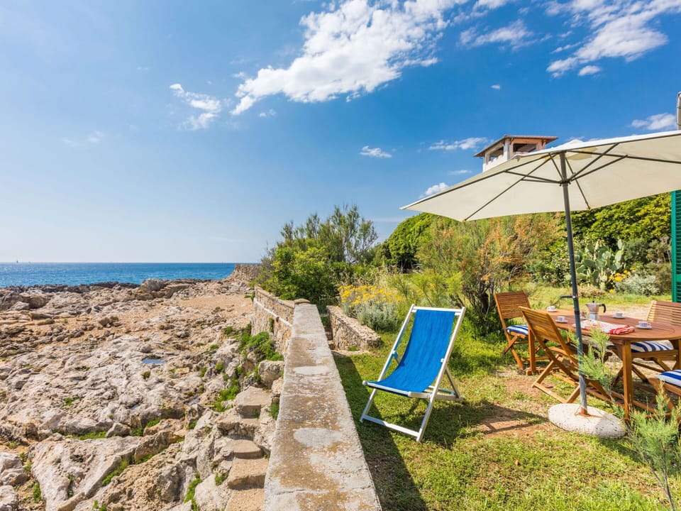 Cloud, Sky, Plant, Ecoregion, Water, Azure, Natural Landscape, Shade, Outdoor Furniture, Coastal And Oceanic Landforms