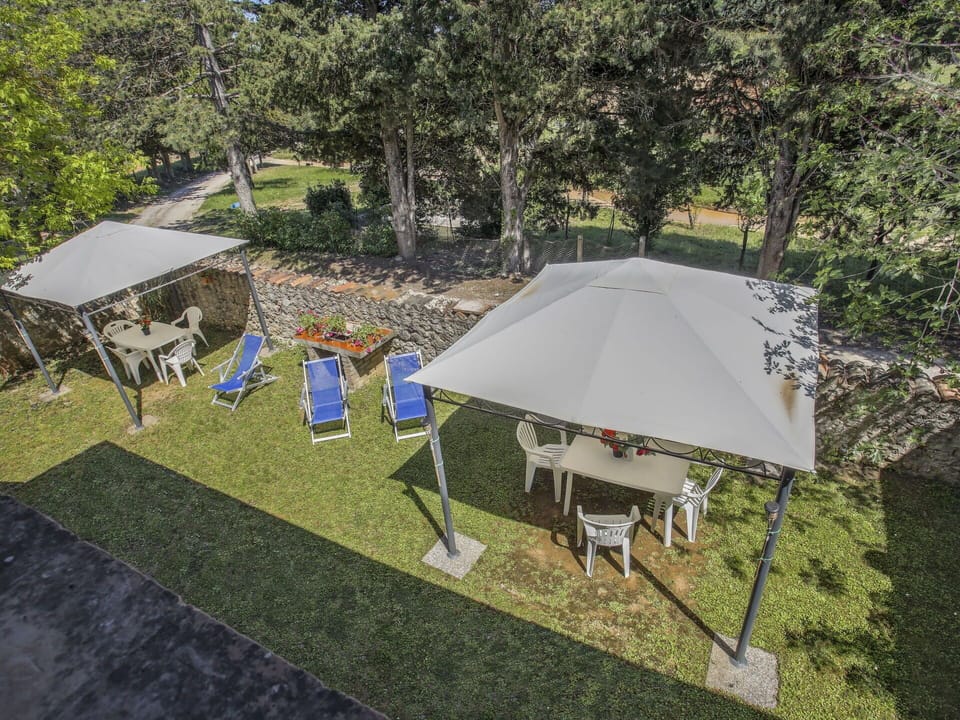 Furniture, Outdoor Furniture, Shade, Chair, Garden, Outdoor Table, Canopy, Backyard, Outdoor Structure, Yard