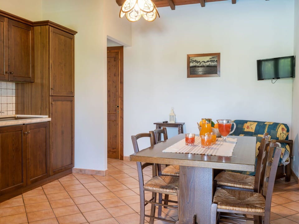 Furniture, Property, Table, Cabinetry, Lighting, Wood, Interior Design, Chair, Floor, Flooring