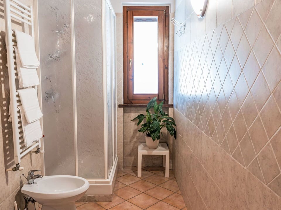 Flooring, Wall, Floor, Interior Design, Tile, Room, Plumbing Fixture, Bathroom, Ceiling