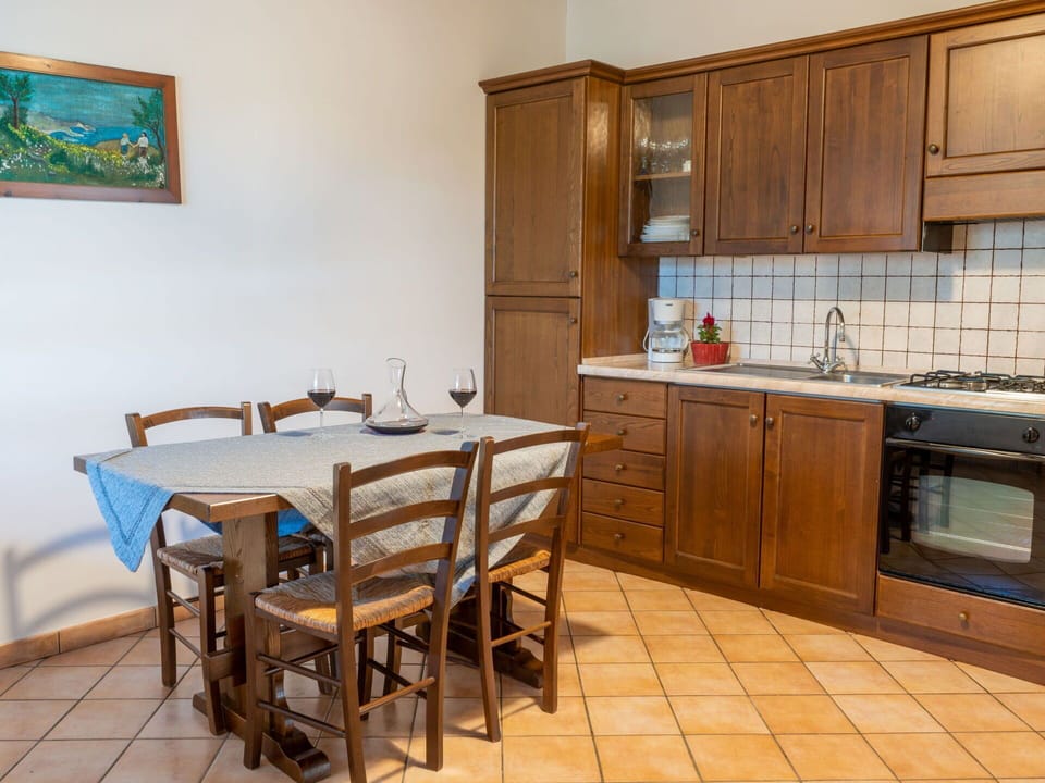 Cabinetry, Furniture, Property, Countertop, Table, Building, Chair, Wood, Kitchen Appliance, Interior Design