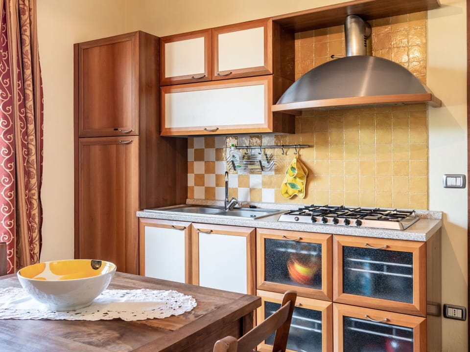 Cabinetry, Table, Property, Furniture, Kitchen Appliance, Wood, Countertop, Kitchen, Interior Design, Exhaust Hood