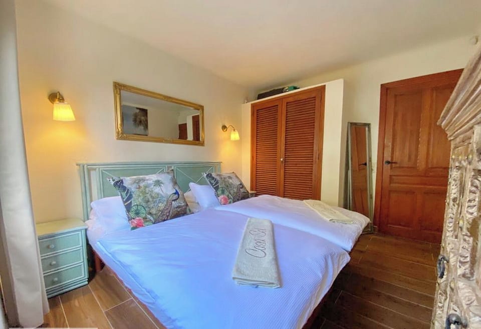 Casa Sol 1st  double bedroom with Air conditioning unit, fitted wardrobe and TV.