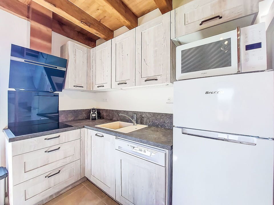 Wood, Major Appliance, Flooring, Cabinetry, Kitchen, Furniture, Kitchen Appliance, Interior Design, Floor, Countertop