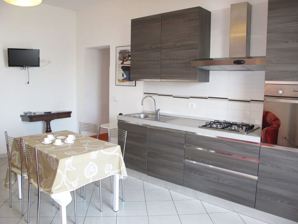 Cabinetry, Furniture, Property, Countertop, Tap, Sink, Kitchen, Kitchen Stove, Wood, Interior Design