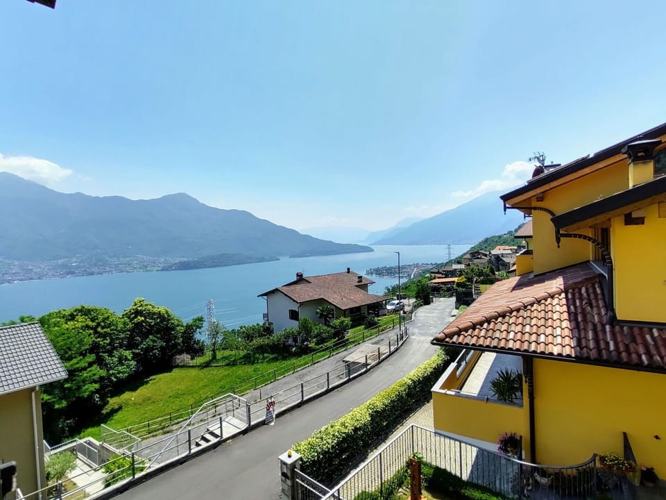 Sky, Plant, Building, Water, Mountain, Azure, Window, Highland, House, Urban Design