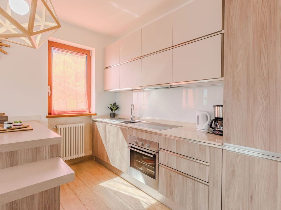 Kitchen, Interior Design, Countertop, Wood, Cabinetry, Flooring, Kitchen Appliance, Major Appliance, Furniture, Ceiling