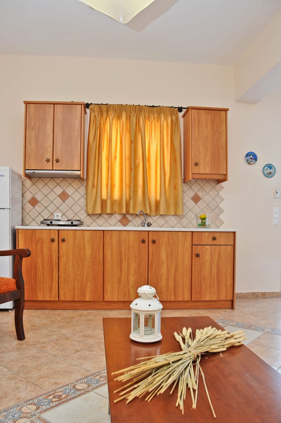 Fridge, stovetop, electric kettle, highchair