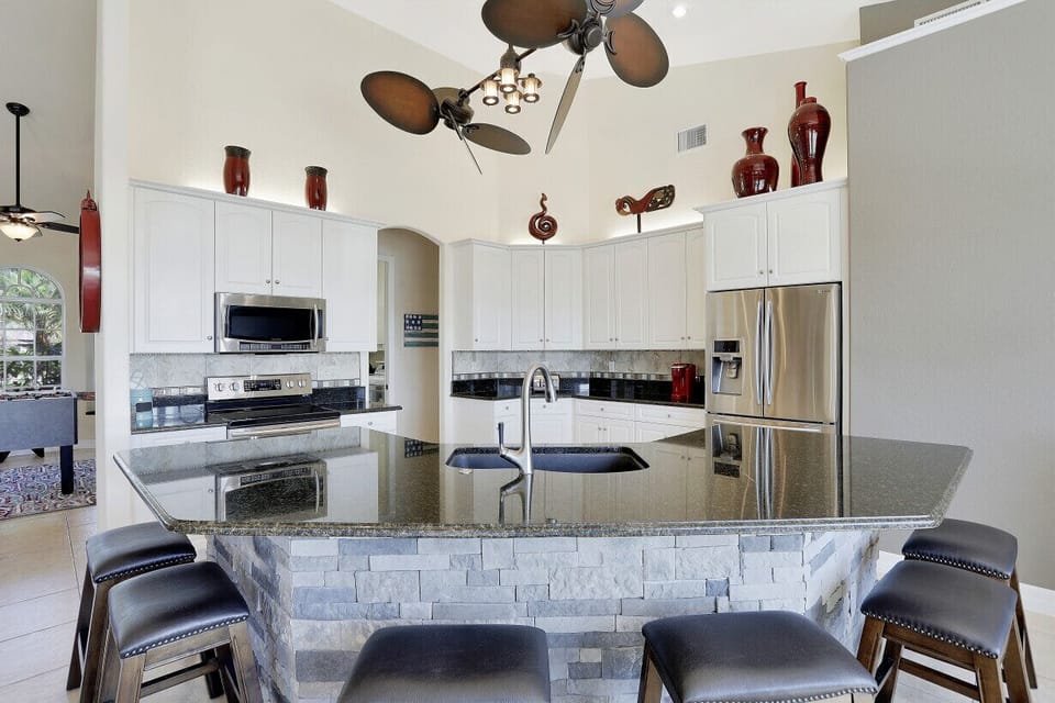 Huge Granite center Island area with stool seating for 6
