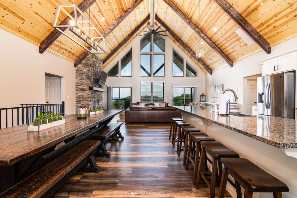 Large great room with gorgeous vaulted ceilings.