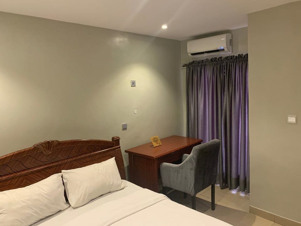 Desk, laptop workspace, blackout drapes, free WiFi