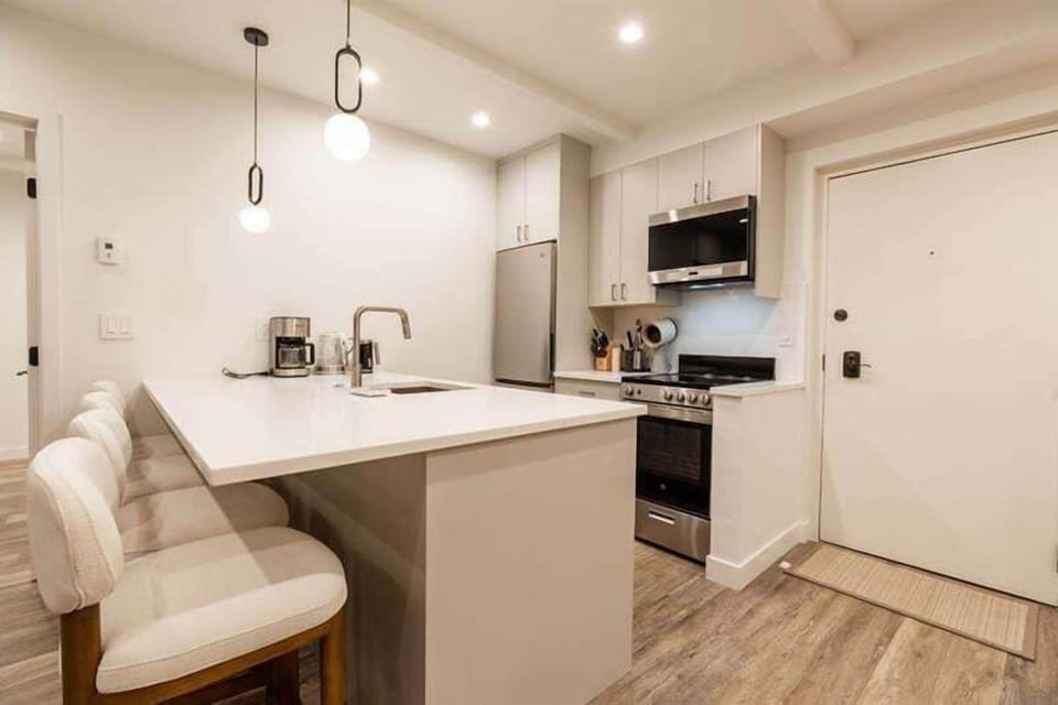 Condo, 2 Bedrooms | Private kitchen | Fridge, microwave, oven, dishwasher
