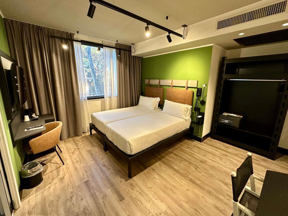 Classic Room, 2 Twin Beds | Down comforters, minibar, in-room safe, individually decorated