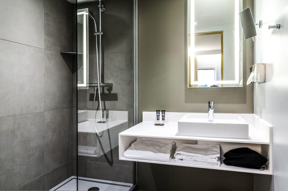 Eco-friendly toiletries, hair dryer, towels