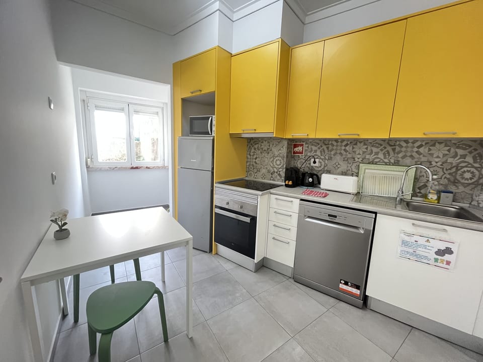 City Apartment, 2 Bedrooms | Private kitchen | Full-size fridge, microwave, oven, stovetop
