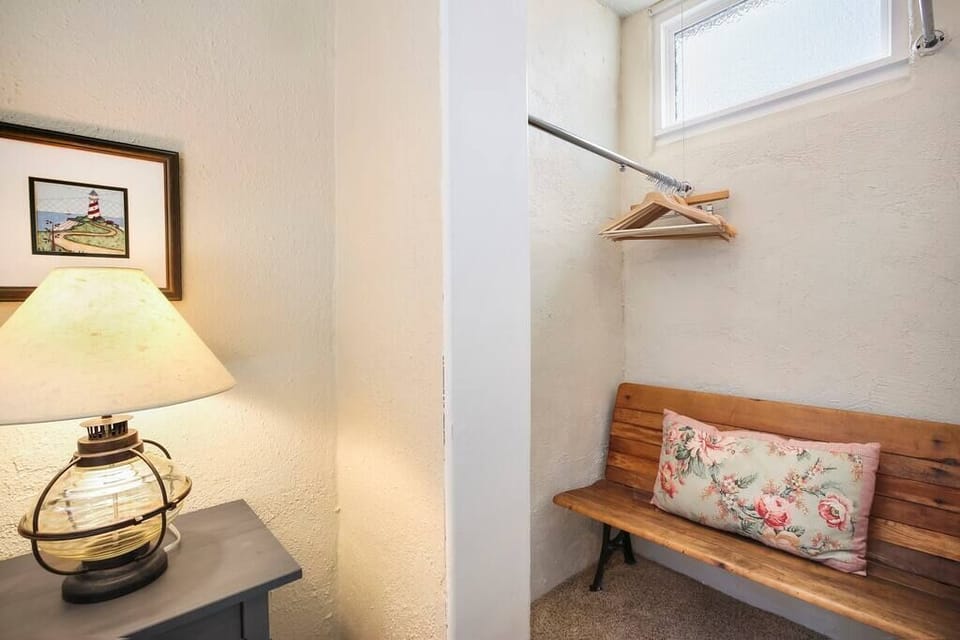 There is space to hang clothes in this unique corner!