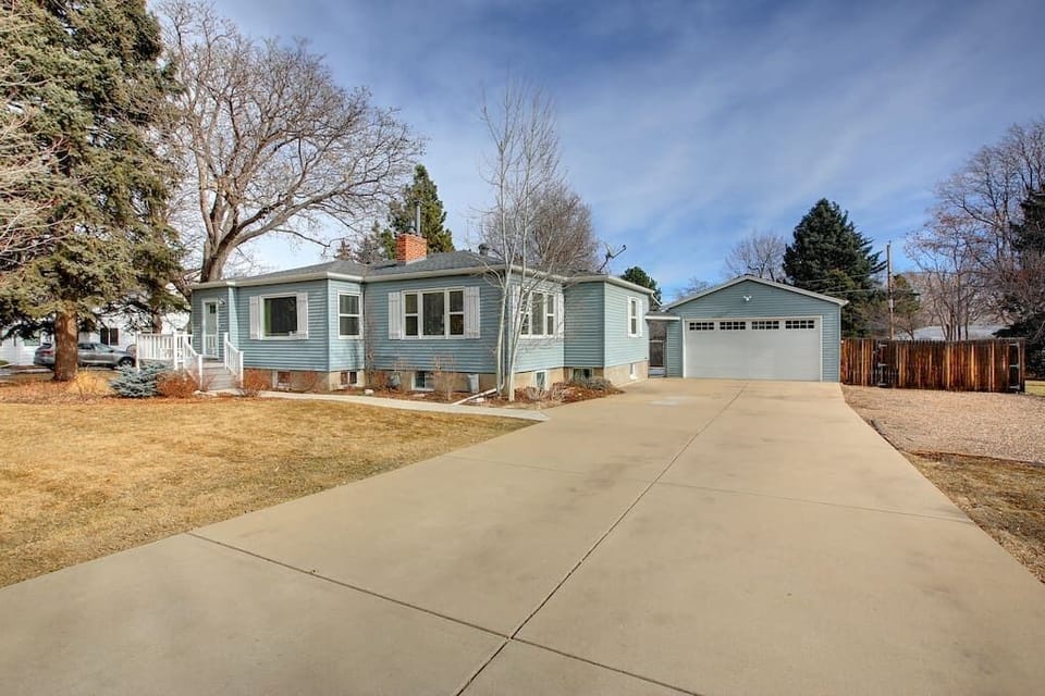 Parking is available on the pebbled area to the right in the photo. You may also park on the street.