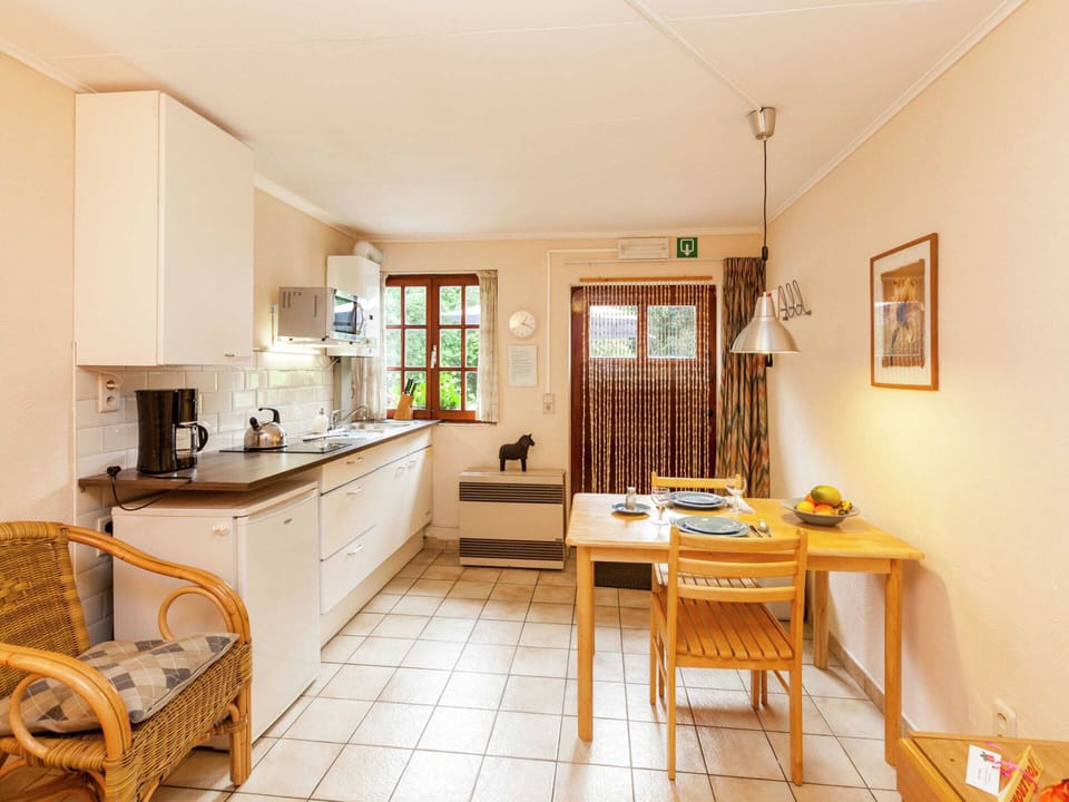 Apartment | Private kitchen | Stovetop, highchair