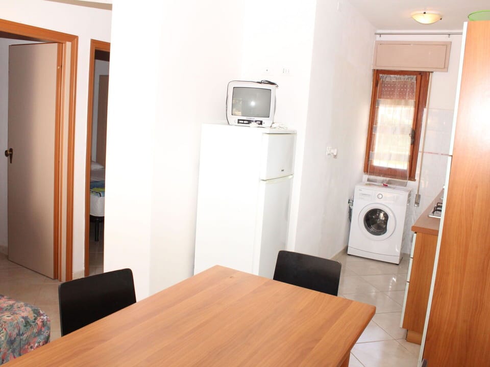 Flooring, Furniture, Floor, Wood, Interior Design, Room, Major Appliance, Door, Wood Stain, Apartment