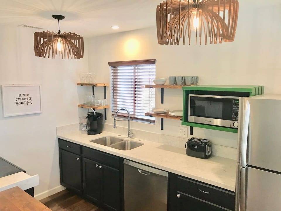 16. Well Appointed Kitchen with Full-Size Stainless Steel Appliances.