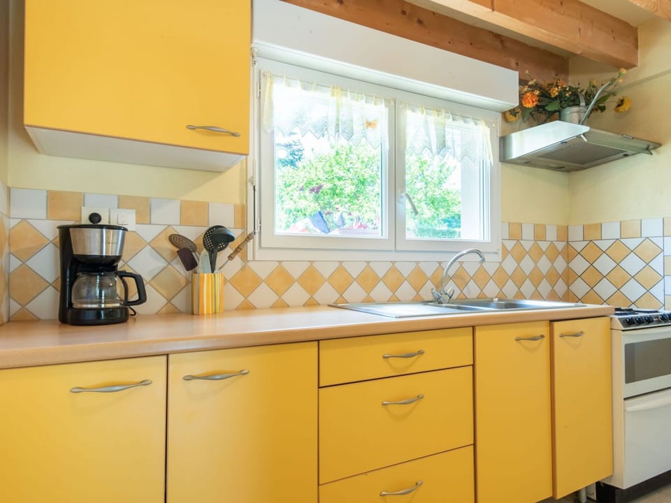 Cabinetry, Countertop, Property, Kitchen Sink, Kitchen Appliance, Kitchen, Drawer, Lighting, Interior Design, Home Appliance