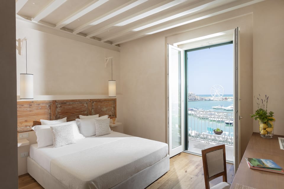Deluxe Quadruple Room, Harbor View, Sea Facing (Vittoria Grande) | Premium bedding, memory foam beds, minibar, in-room safe