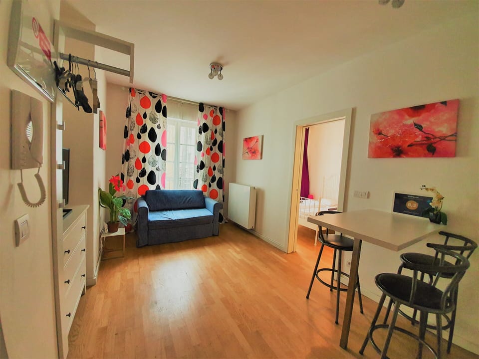Comfort Apartment | Living area | 42-inch LED TV with satellite channels, TV