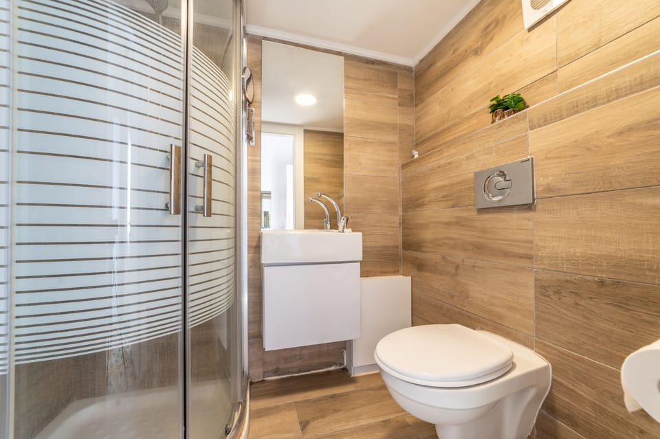 Classic Studio, Balcony, City View | In-room safe, desk, laptop workspace, blackout drapes