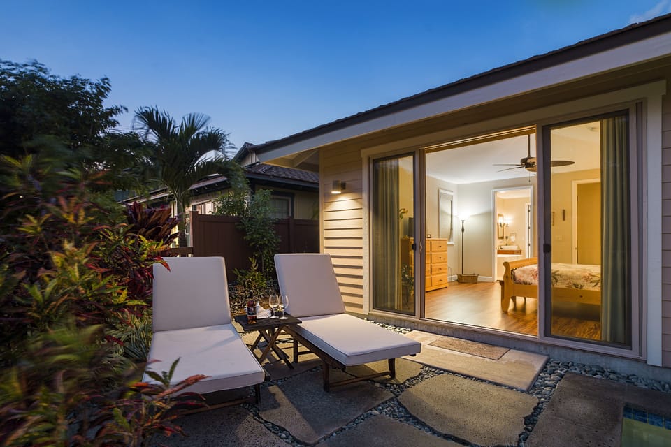 Enjoy starry evenings or sunny mornings on the private lanai of Kona Blue Vacations Holua Kai’s primary suite.