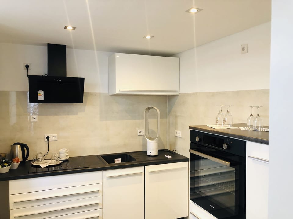 Deluxe Suite | Private kitchen | Highchair