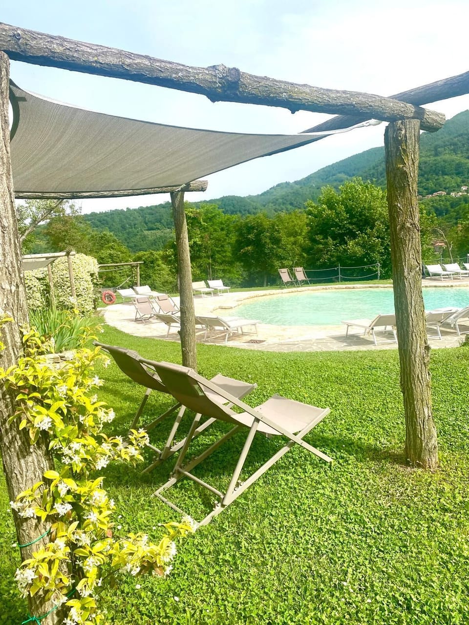 Seasonal outdoor pool, open 9:00 AM to 6:00 PM, sun loungers