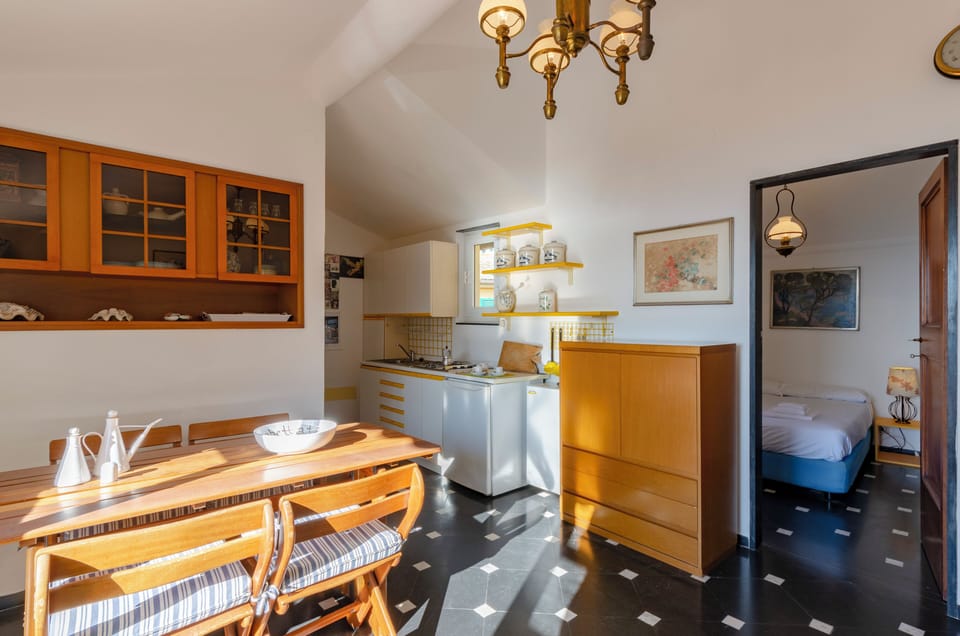 Apartment, 1 Double Bed with Sofa bed, Terrace, Sea View | Private kitchen | Fridge, dining tables