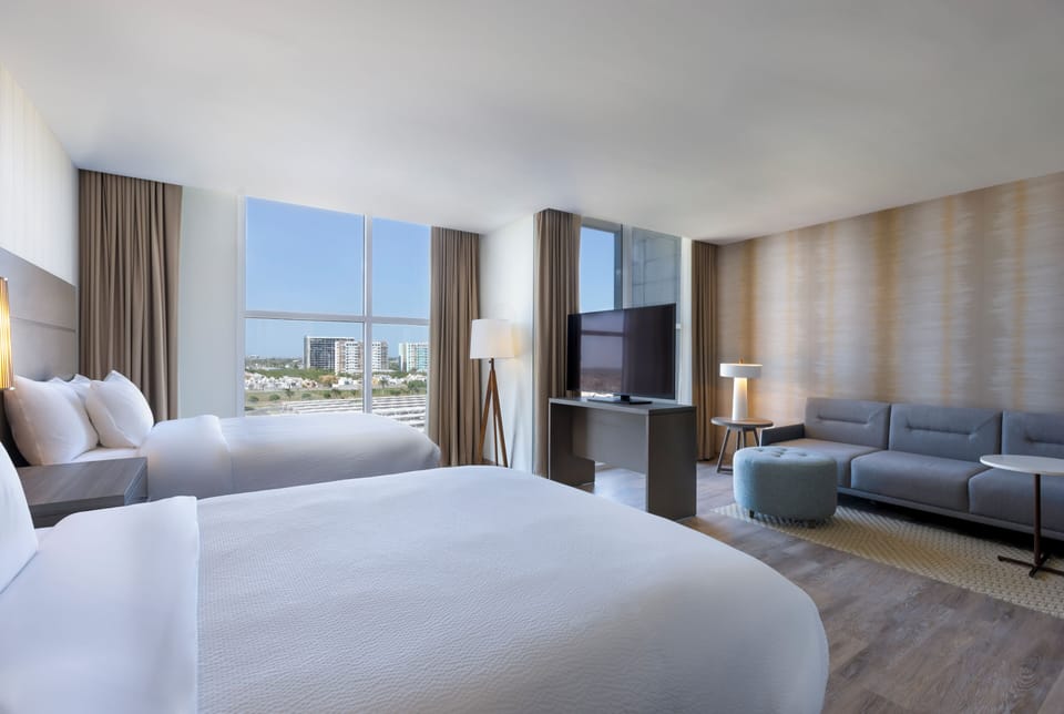 Studio, 2 Queen Beds, City View | In-room safe, laptop workspace, blackout drapes, soundproofing