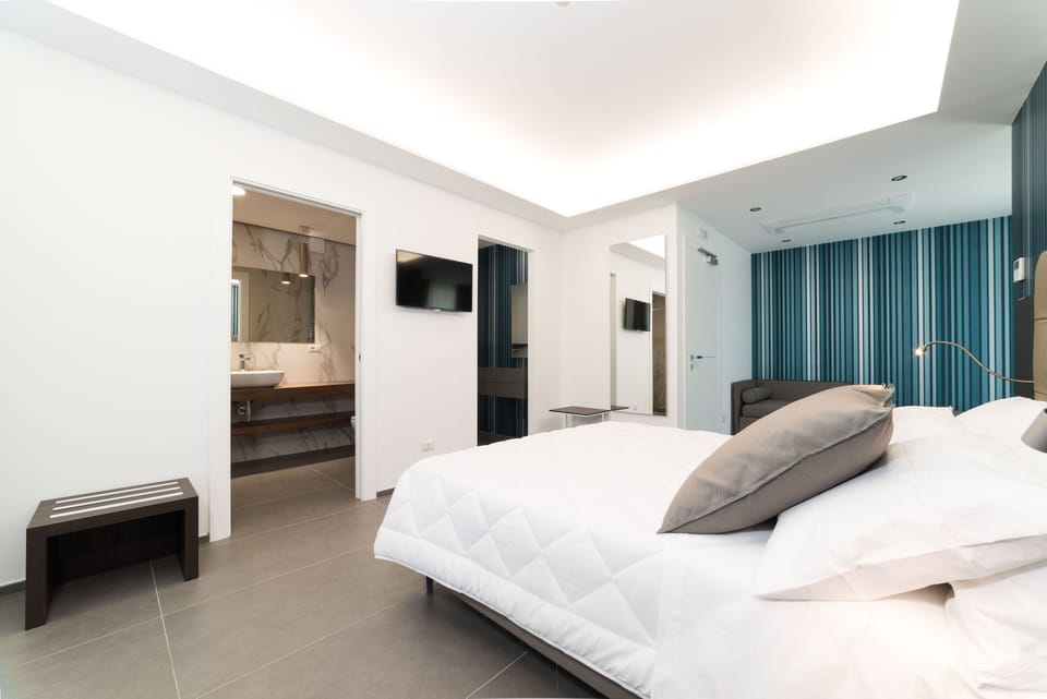 Deluxe Triple Room | Premium bedding, down comforters, minibar, in-room safe