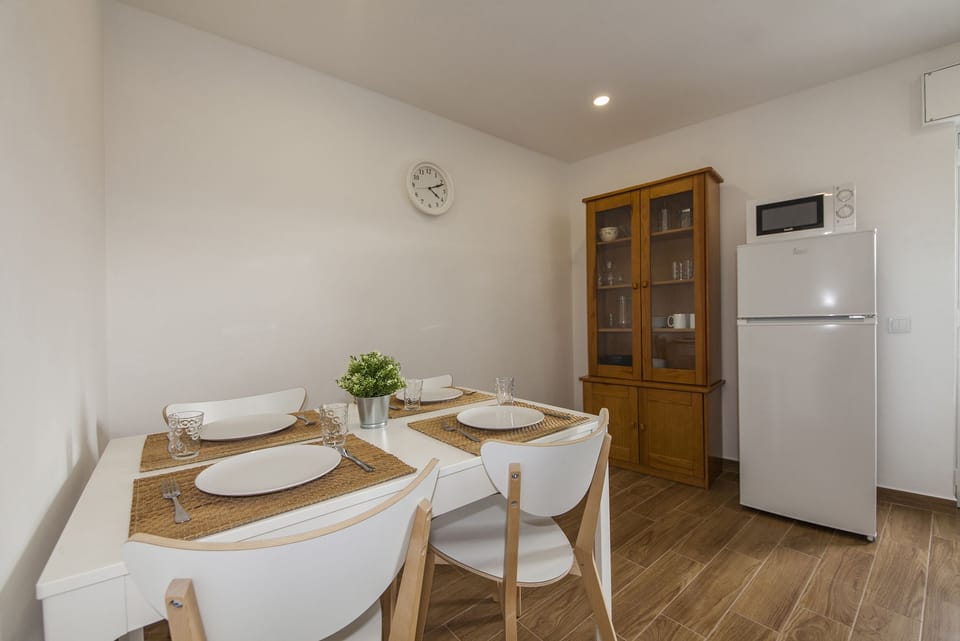 Apartment, 1 Bedroom | Living area | Flat-screen TV