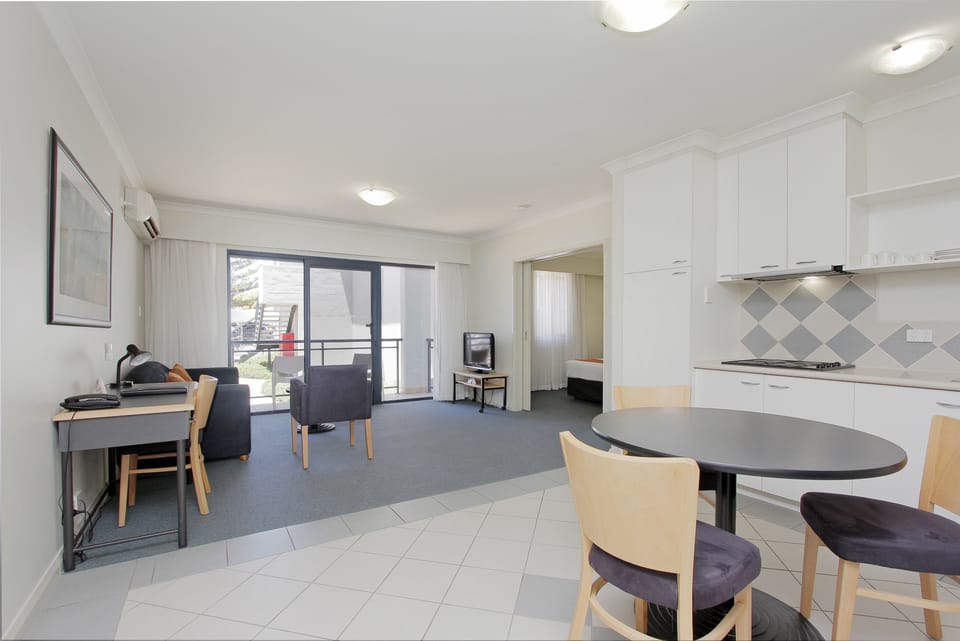 1 Bedroom Spa Apartment Resort View | In-room safe, desk, blackout drapes, iron/ironing board