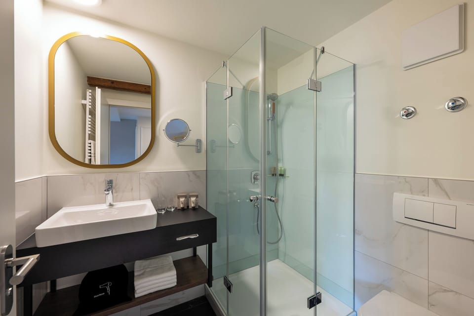 Shower, free toiletries, hair dryer, towels