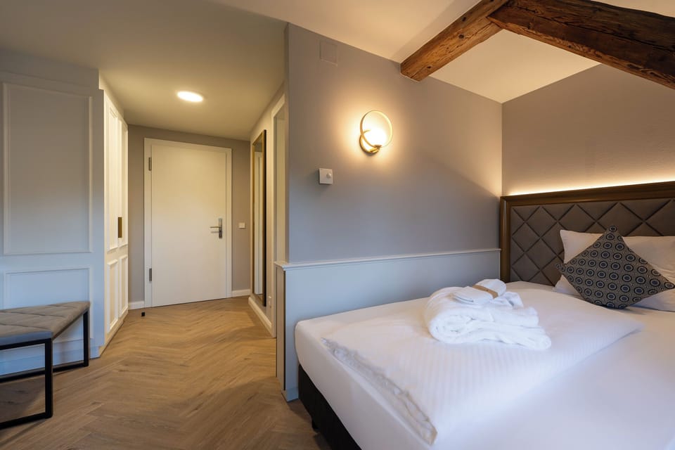 Deluxe Single Room | Hypo-allergenic bedding, desk, blackout drapes, iron/ironing board