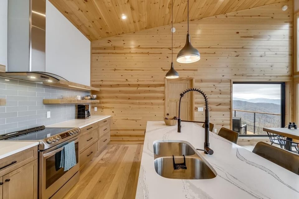 kitchen with master bedroom door in distance