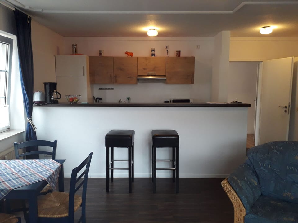 City Apartment | Living area | 20-inch TV with satellite channels