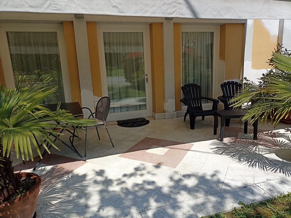 Studio facade "junior suite" - private entrance and patio of the room