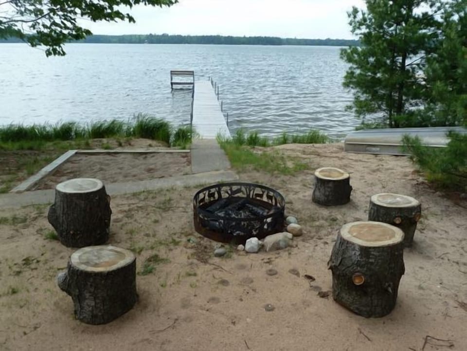Firepit right off the lake in front of the cabin.