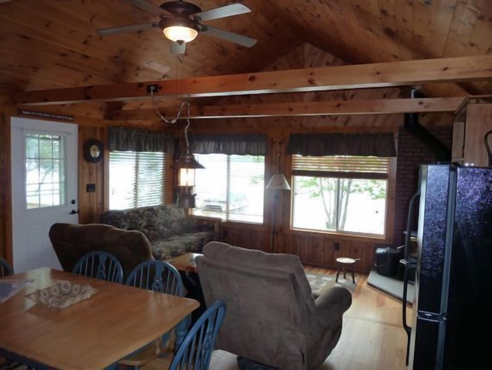 View from kitchen/dining area.  Two great lazy boy chairs to capture the view.