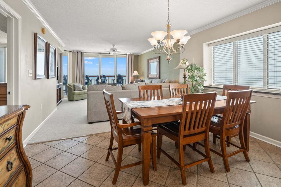 Dine with an ocean view at South Shore Villas 1207, a 4-bedroom Crescent Beach condo rental