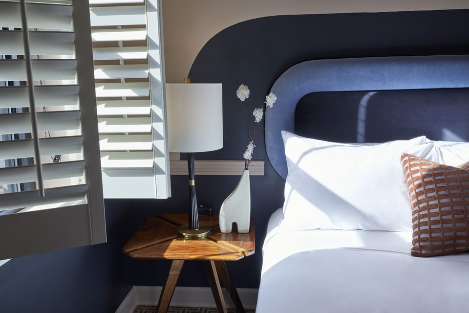 Economy Room, 1 Queen Bed | Premium bedding, down comforters, pillowtop beds, minibar