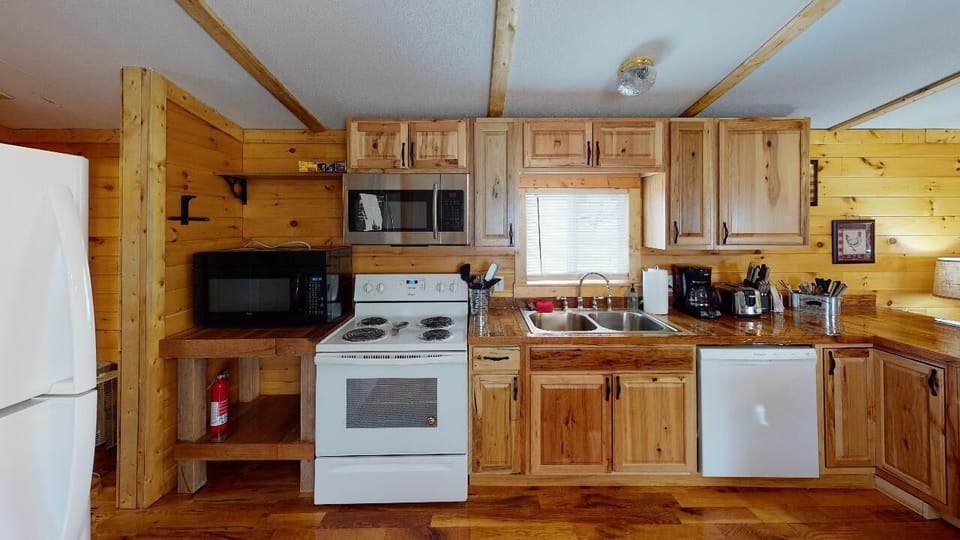 Kitchen comes equipped with all your basic amenities and appliances. 