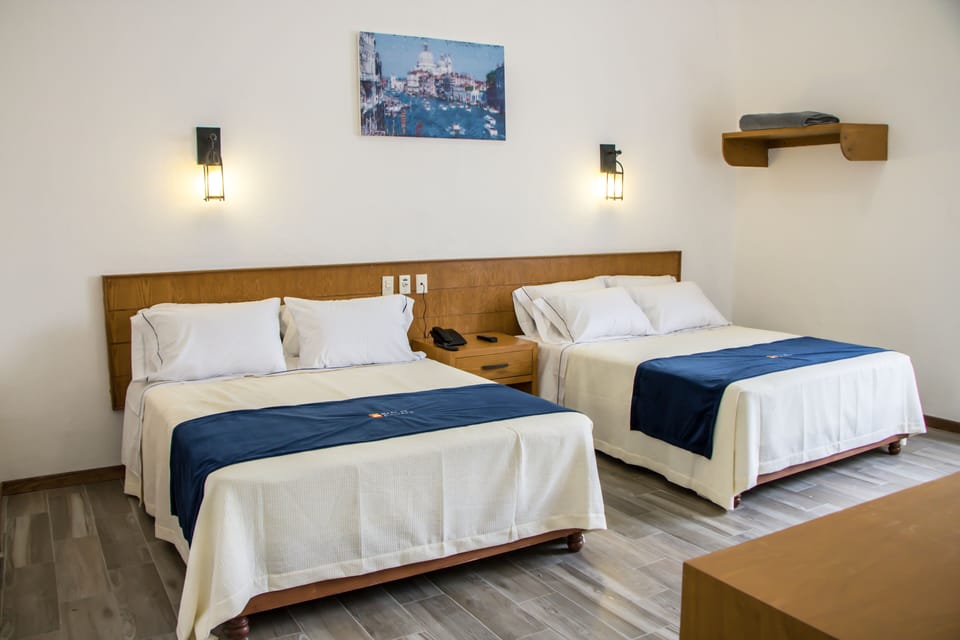 Room, 2 Queen Beds | Desk, free WiFi, bed sheets