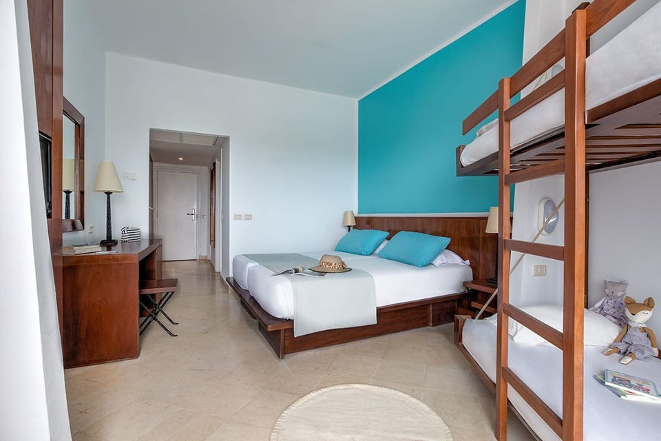 Quadruple Room | Select Comfort beds, minibar, in-room safe, desk