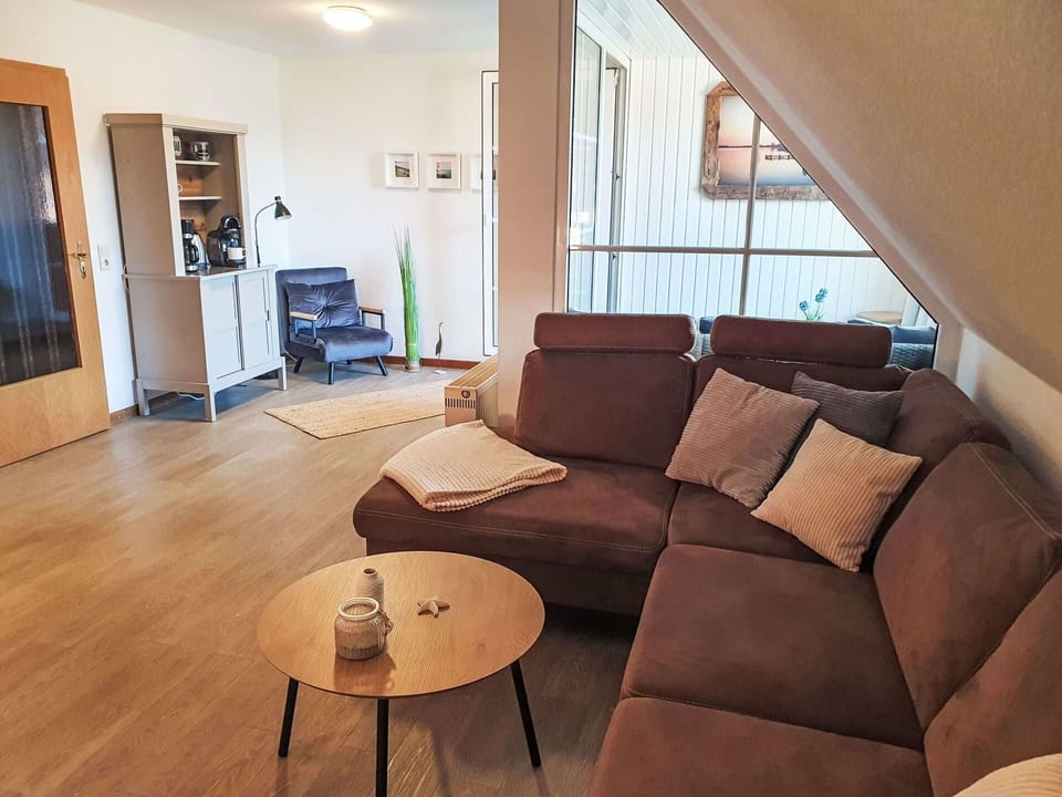 Furniture, Interior Design, Flooring, Couch, Floor, Wood, Living Room, Apartment, Room, Wood Flooring
