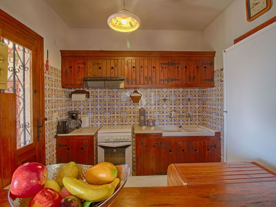 Property, Furniture, Table, Cabinetry, Wood, Lighting, Interior Design, Window, Yellow, Drawer